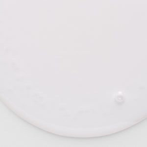 Skin Regimen LX Microalgae Essence – losjono tekstūros artimas planas