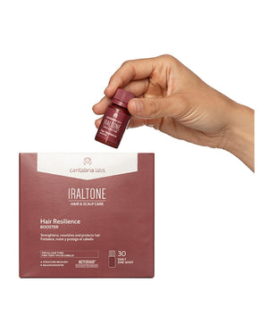 IRALTONE Hair Resilience Booster papildai ampulėmis, pakuotė ir ampulė rankoje